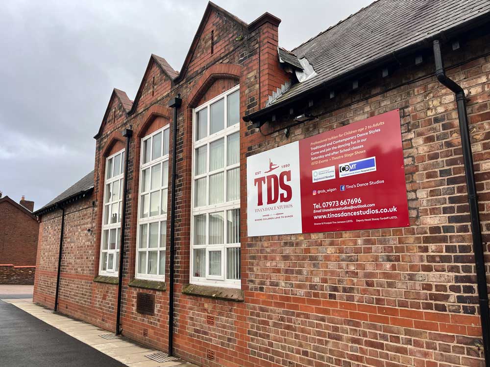 School-building-new-sign