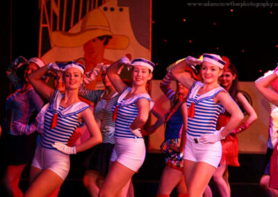 girls in blue and white striped shirts